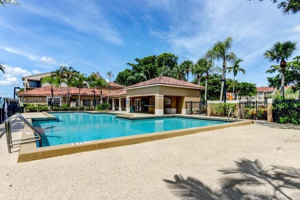 Photo of 1129 Lake Victoria Dr #F, West Palm Beach, FL 33411 (MLS # A11998173)