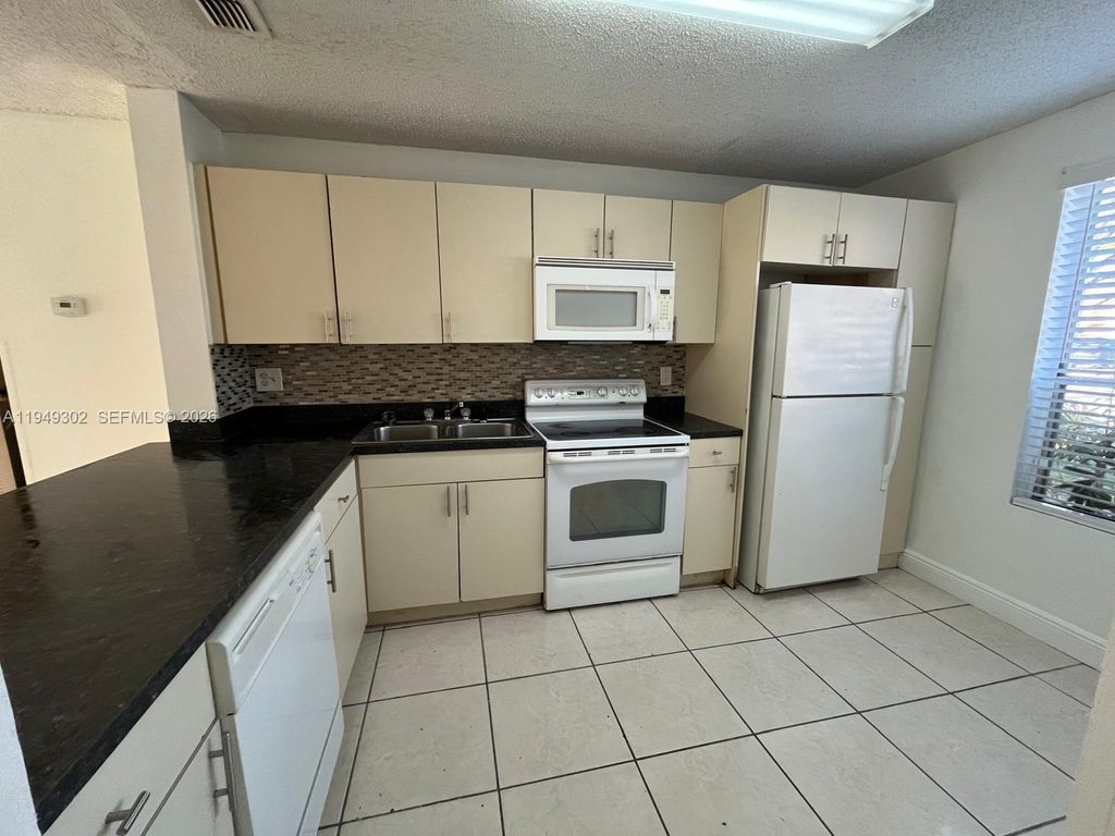 Photo of 8028 SW 21st Ct #8028, Miramar, FL 33025 (MLS # A11949302)