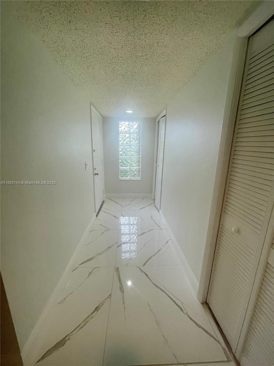 RACQUET CLUB APARTMENTS A - Residential Lease