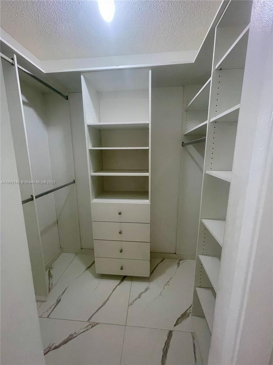 RACQUET CLUB APARTMENTS A - Residential Lease