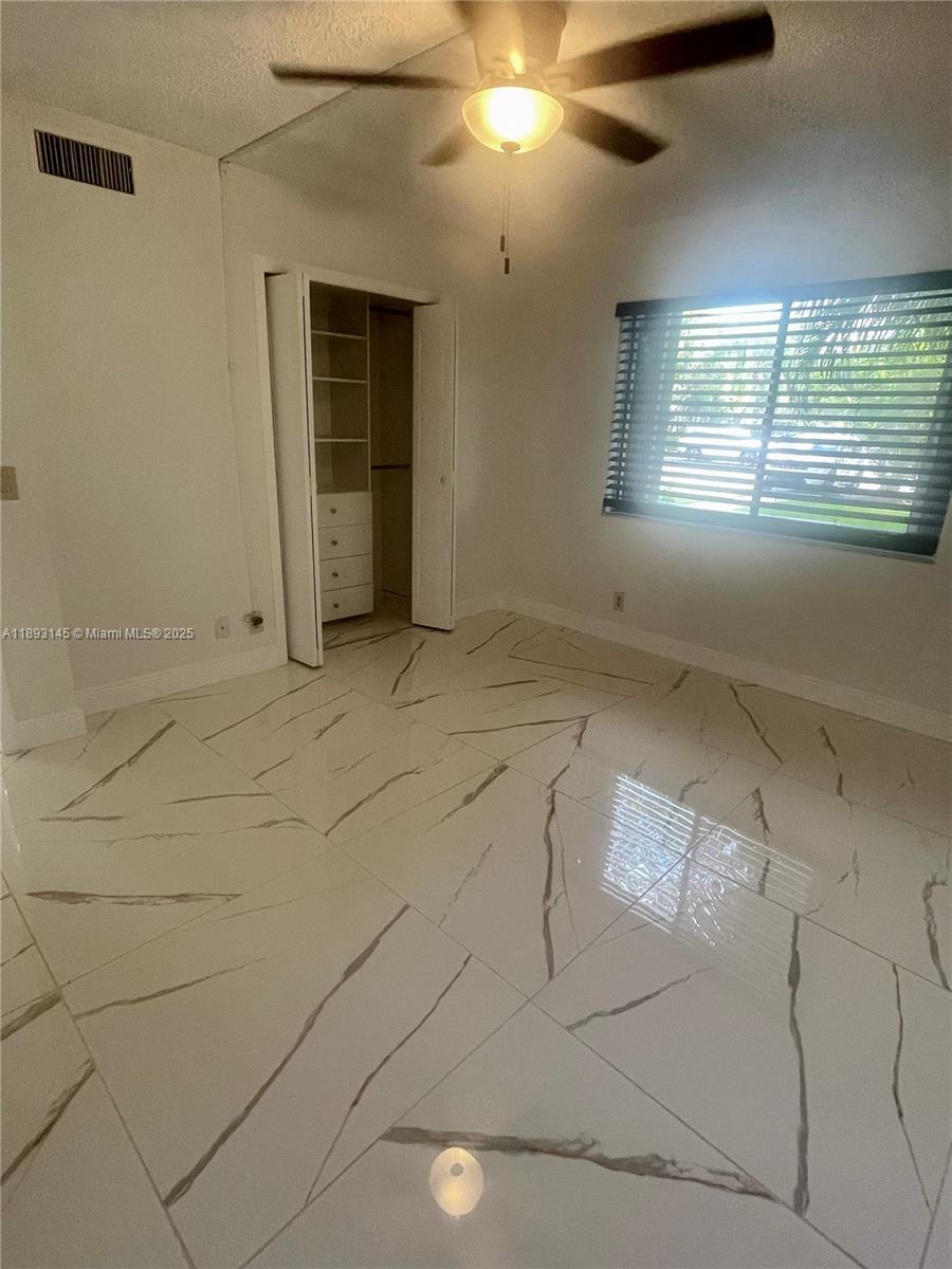 RACQUET CLUB APARTMENTS A - Residential Lease