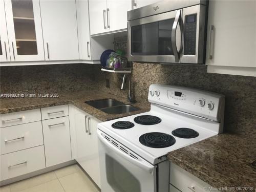 Location, Location, Location. Remodeled, large two bedroom convertible with two full baths. (like 3 bedroom) The den was converted to a bedroom with a private bathroom. Beautiful Apartment in the heart of Aventura. Nice floor, kitchen and bath. Walking distance to Aventura Mall, Restaurants and house of worship. Come and see.