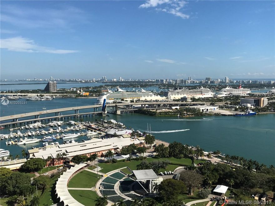 Amazing City and Bay Views from this Corner 2 BR Unit! Partially Furnished, with BRAND NEW Porcelain Glass floors. Master Bedroom with double vanities, Jacuzzi Tub & Glass Shower, Kitchen with STAINLESS STEEL APPLIANCES and GRANITE Counter Tops, Walk-in Closets, very spacious unit. Enjoy great Building's Amenities, walking distance to Downtown and Brickell restaurants, cafes, and shopping.