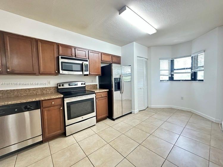 LOCATED ON THE SECOND FLOOR , STAINLESS STEEL APPLIANCES, BEAUTIFUL UNIT!!