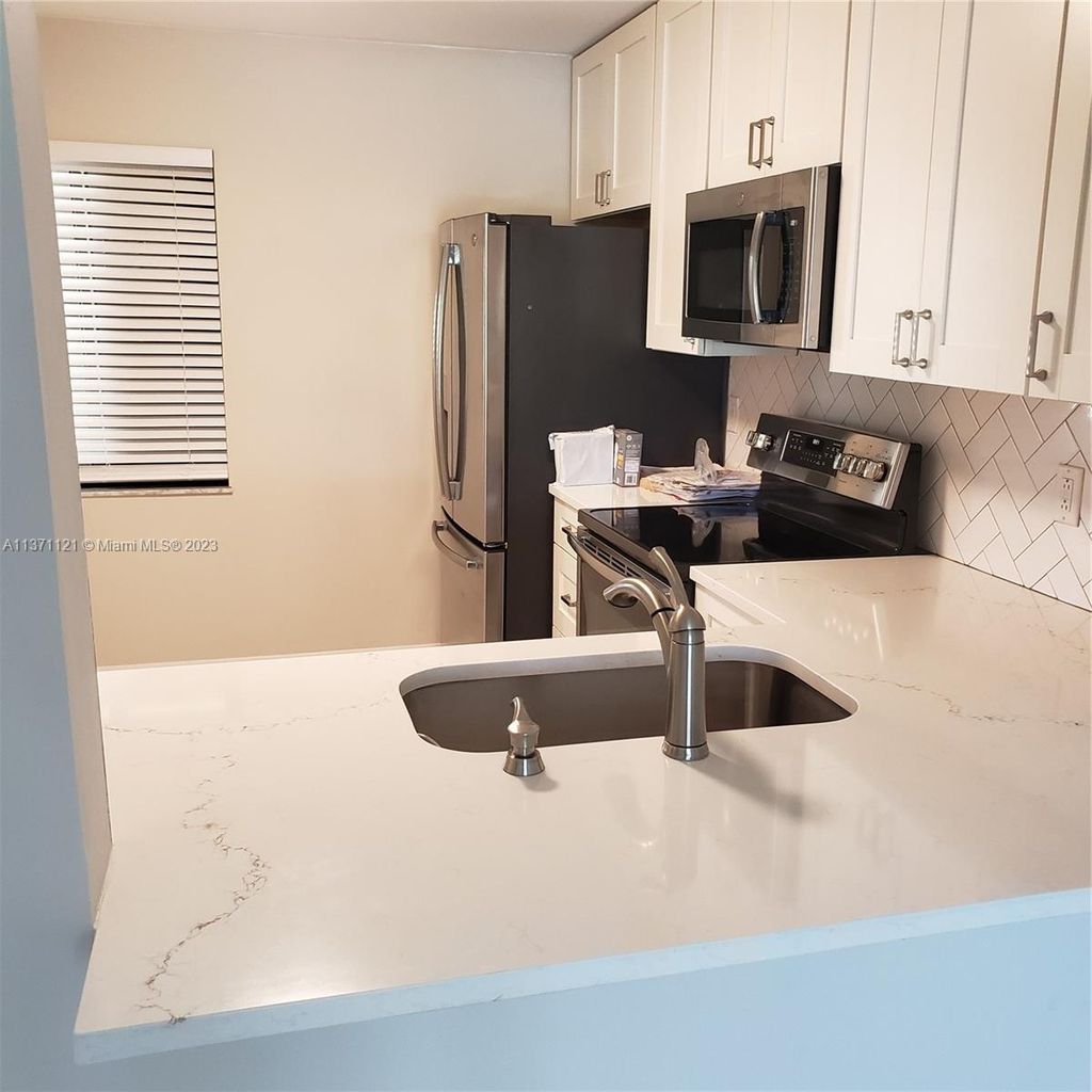 Photo of 6940 SE Constitution Blvd #205, Hobe Sound, FL 33455 (MLS # A11371121)