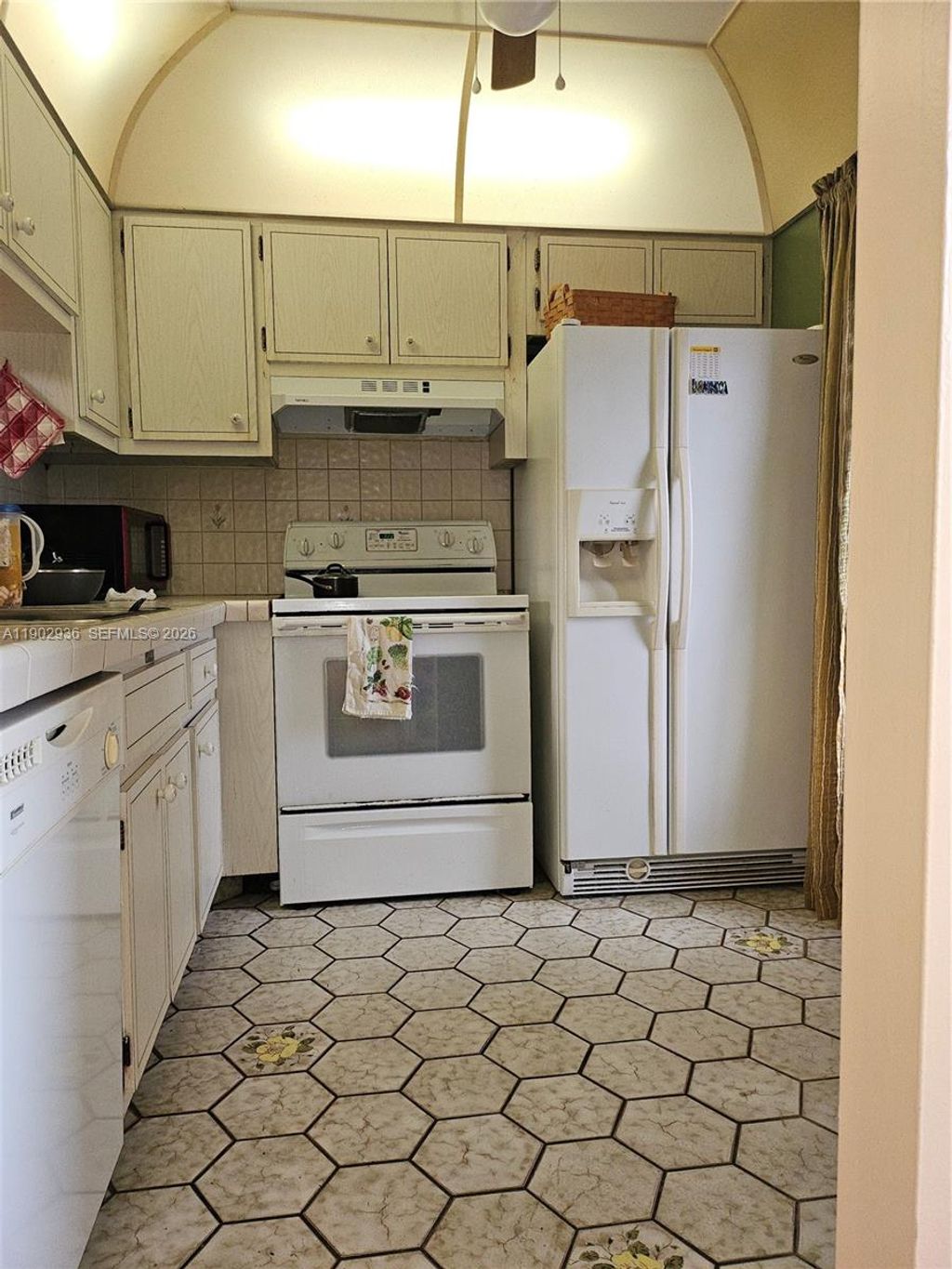 Photo of 5121 W Oakland Park Blvd #211, Lauderdale Lakes, FL 33313 (MLS # A11902936)