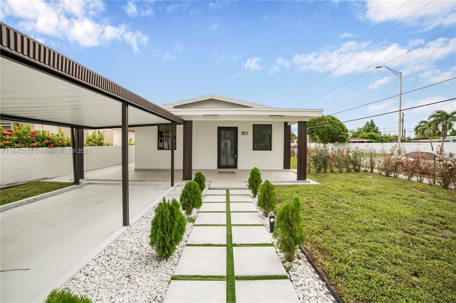 Beautifully Renovated Corner Home! This 3-bedroom, 1-bath home was completely remodeled in 2025 and showcases modern finishes throughout. Features include a brand-new kitchen with sleek countertops and stainless steel appliances, stylish ceramic tile flooring, and a laundry room with washer and dryer. Recent upgrades include a new roof, impact windows and doors, brand-new A/C, and a new water heater. This move-in ready home offers the perfect blend of style, comfort, and peace of mind. Easy to show through ShowingTime. Lockbox on site—schedule your private showing today!