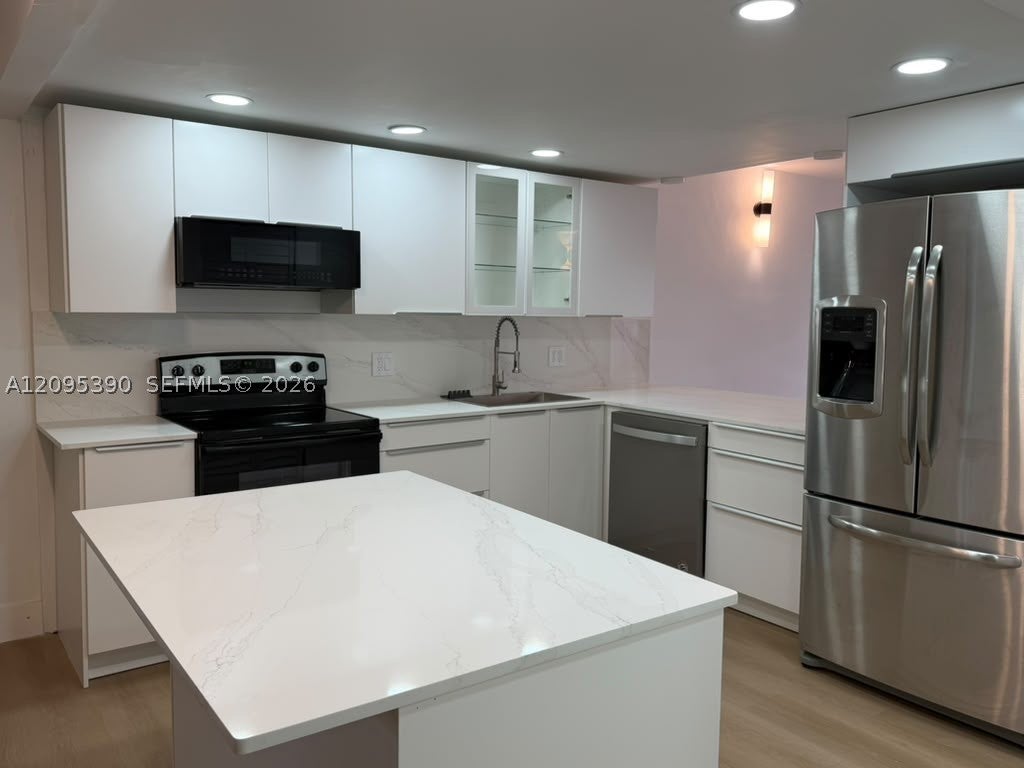 Photo of 639 N University Dr #17, Plantation, FL 33324 (MLS # A12095390)