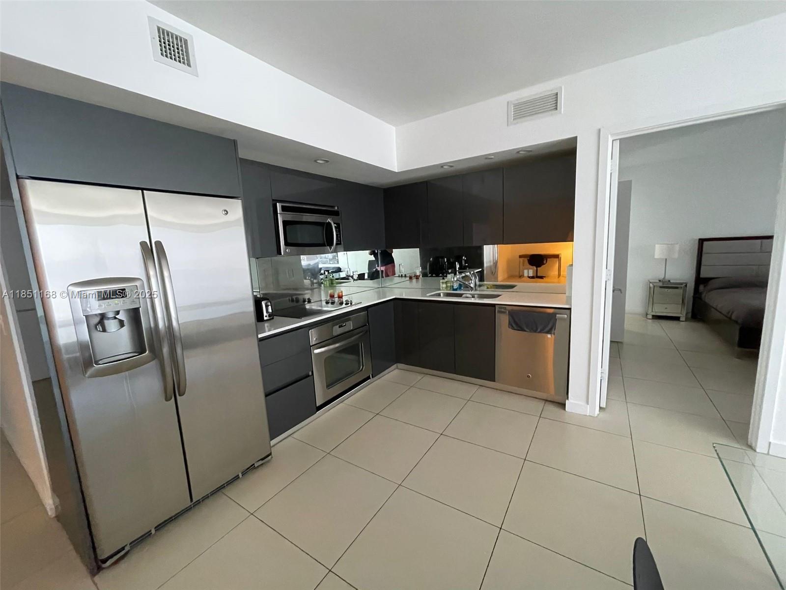 Beautiful unit with 2 bedrooms and 2 full bathrooms plus a large den, located in Brickell, just 1 block from Brickell City Center. The apartment is fully furnished and ready to move into. The apartment includes space for one vehicle, if you store a second vehicle the cost is $175 monthly. Easy access to the Miami airport, and easy access to the I95 highway. It is possible to rent it temporarily, minimum 3 months, ask the price.