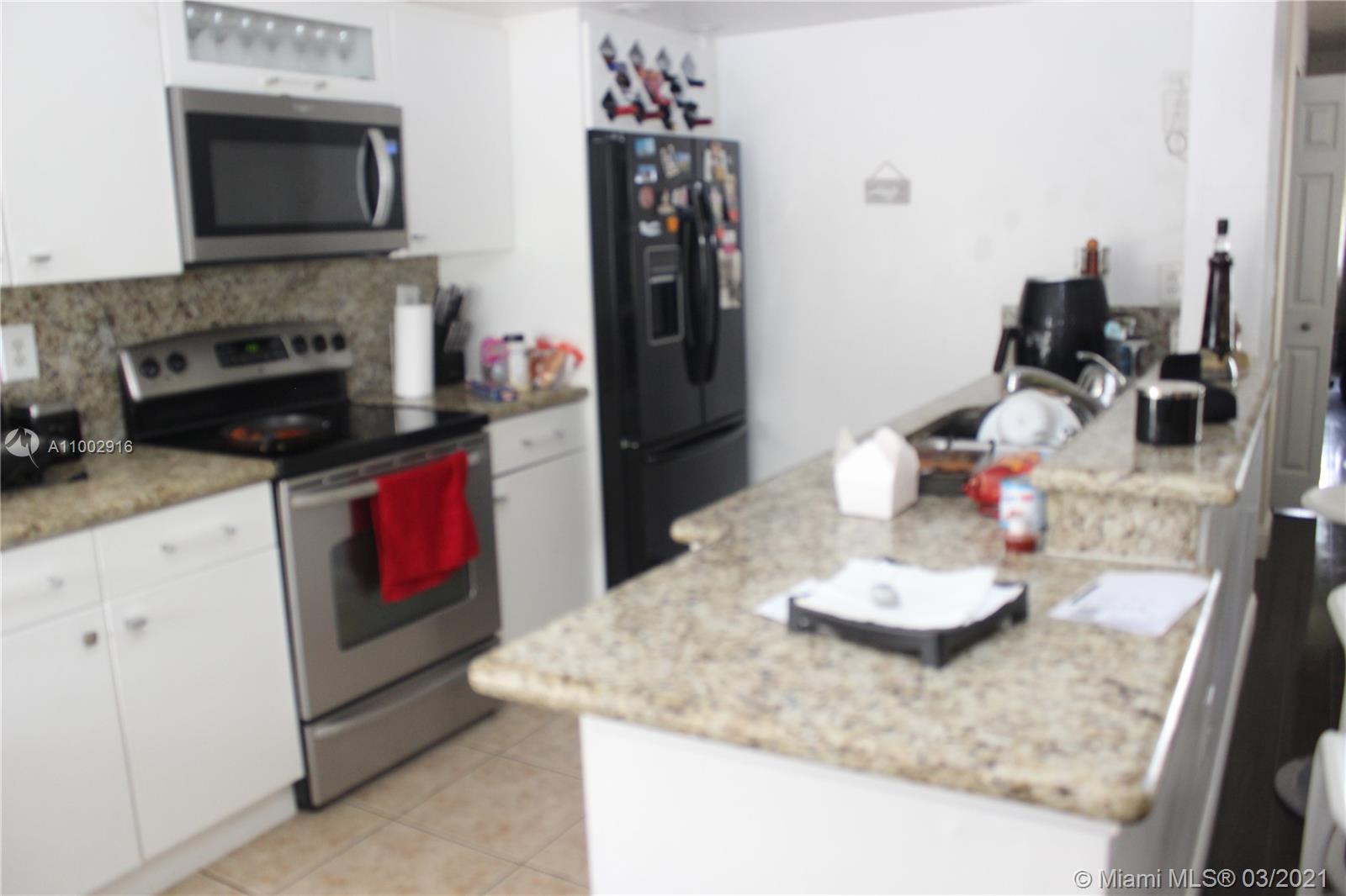 THE GREENS AT DORAL CONDO - Residential