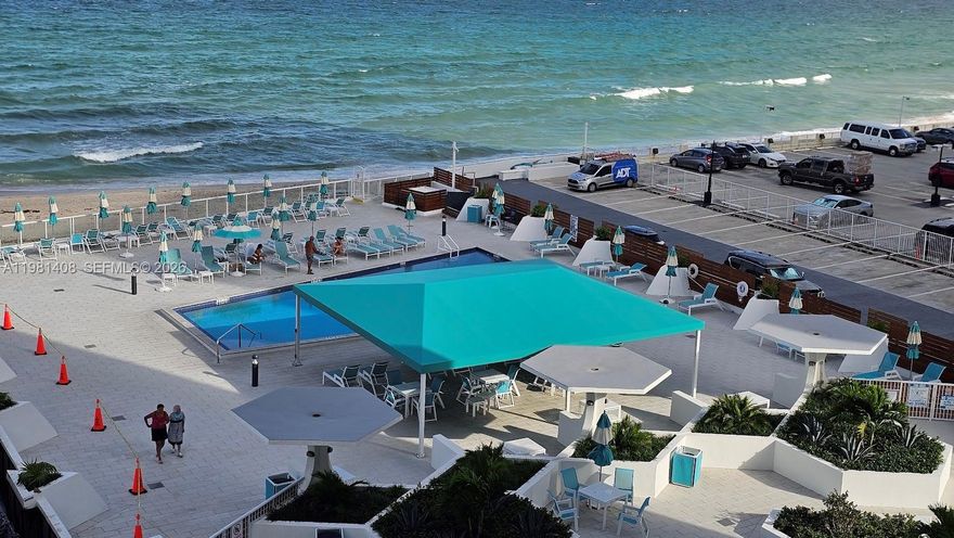 Ocean view can be seen from both bedrooms. Unit has 2 fulls baths and a additional den that can be used for office space, storage or bedroom. Fully furnished and fully-equipped with appliances and impact windows & sliding balcony door. Gym is Downstairs on lobby floor next to the elevators, Has sauna, billiard room. pool & beach service. Close to many shopping plazas and Aventura Mall, Sunny Isles Beach and minutes away from Hollywood Beach.