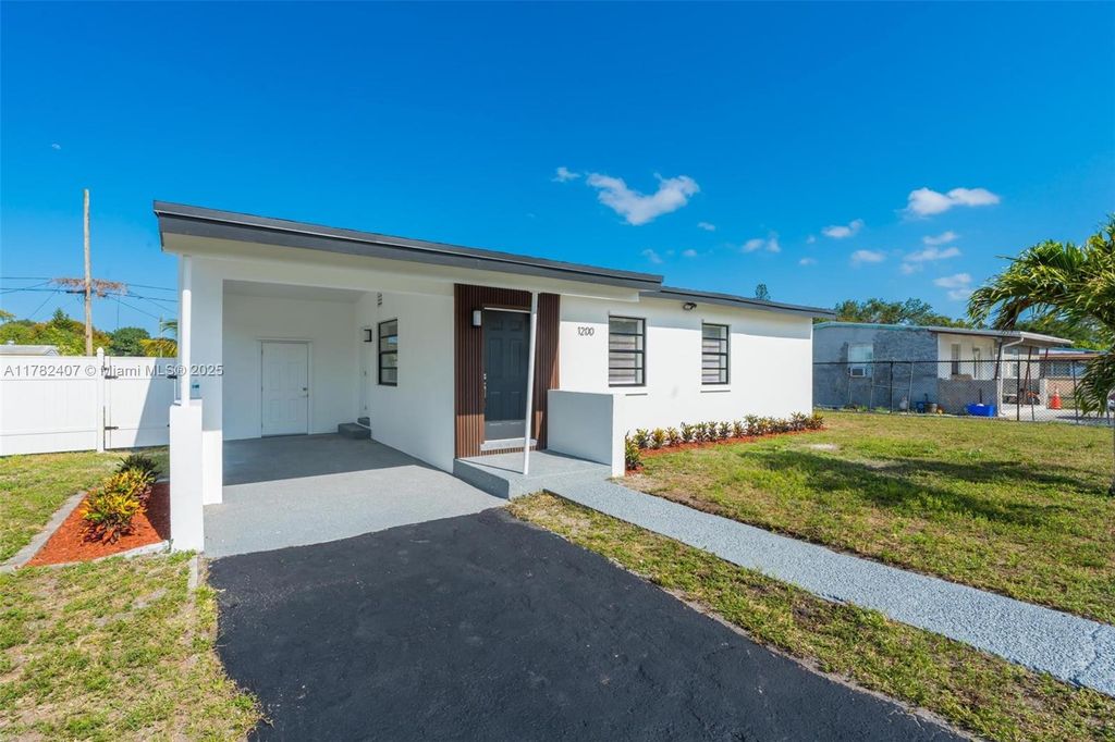 Photo of 1200 NW 19th Ave, Fort Lauderdale, FL 33311 (MLS # A11782407)