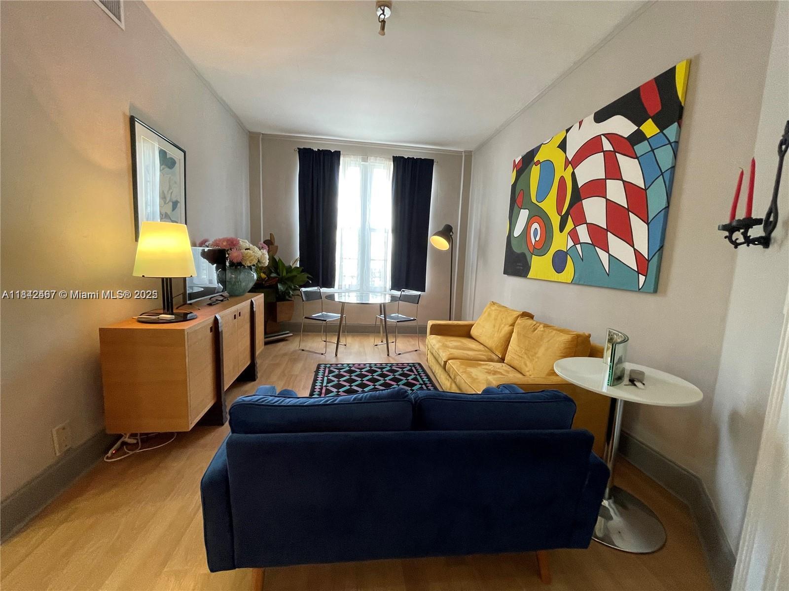 UNIQUE 1 bed / 1 bath apartment at the amazing Beverly Terrace Historic condo building in the Edgewater neighborhood. The building was recently updated to include impact windows and a new exterior façade with plenty of natural light. The unit is located on the first floor, fully furnished with designer furniture from Italy and equipped it has central air, original wood floors, living room with 2 entrances, and gated assigned parking (1 space). Minutes from Wynwood, Design District, Brickell, South Beach, airport and major highways. Washer and dryer on site (common use). NO PETS as per rules and regulations.