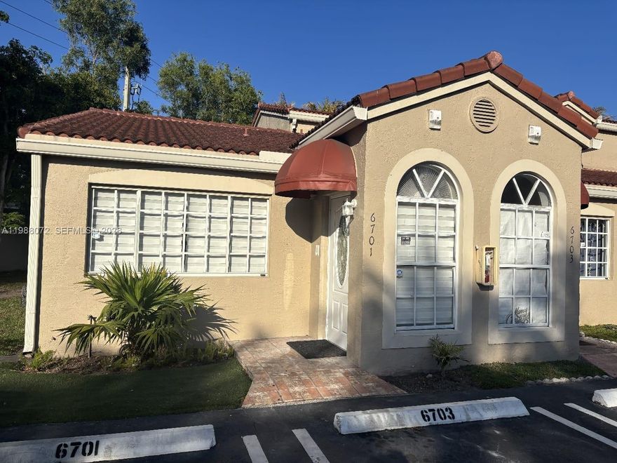 This is a rare villa/ townhouse 1/1 corner unit in Fountain Park.  It has its own rear patio to unwind from a hectic workday. Washer and dryer in the unit, spacious bedroom with walk in closet. The Parking is in front of unit. Community Pool access. Prime Miami Lakes Location.- walking distance to shopping center. Top rated schools, quick access to major expressways. ONLY 1 month + security deposit to move in. Will not last!