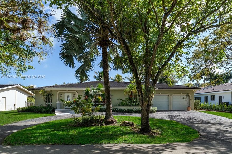 Nestled in the gated community of Gables by the Sea, this 4 bdrm 3 bath serene canal-front residence offers 100' of freshwater access on a 12k sf lot with a circular brick driveway, creating a peaceful setting surrounded by lush landscaping & mature palm trees. This light-filled home offers an opportunity to refresh the existing charm of this well-constructed 1972 ranch style beauty. The floor plan includes 2 ensuite baths and generous closets. The gracious foyer entry welcomes you to formal living & dining areas and family room w/direct pool/veranda access. The spacious kitchen offers a great opportunity to enhance the exiting features including a convenient pass-through bar opening directly to the pool and patio. Additional highlights include impact glass & custom plantation shutters. A 2-car garage includes a laundry area with washer/dryer & utility sink. Outdoor living is peaceful & inviting, featuring a screened 30x15 pool overlooking the freshwater canal, a veranda w/ceiling fans, & cabana bath for added convenience. The lush yard offers plenty of green space to relax & play while enjoying tranquil waterfront views. The private seawall and dock create the perfect launch point for paddle boarding, kayaking, or canoeing. Ideally located near the area’s finest parks, marinas, and amenities. Residents of the gated community also enjoy a neighborhood park with a playground, gazebo for gatherings, open grass field, and basketball court, all near top-rated schools.