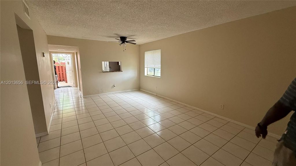 Photo of 8011 Southgate Blvd #L1, North Lauderdale, FL 33068 (MLS # A12013656)