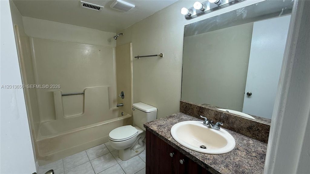 Photo of 8011 Southgate Blvd #L1, North Lauderdale, FL 33068 (MLS # A12013656)