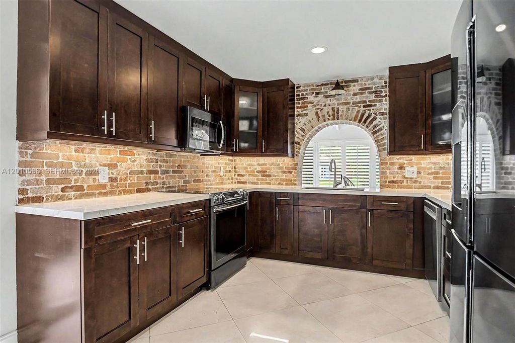 Photo of 2081 Augusta, Weston, FL 33326 (MLS # A12010596)