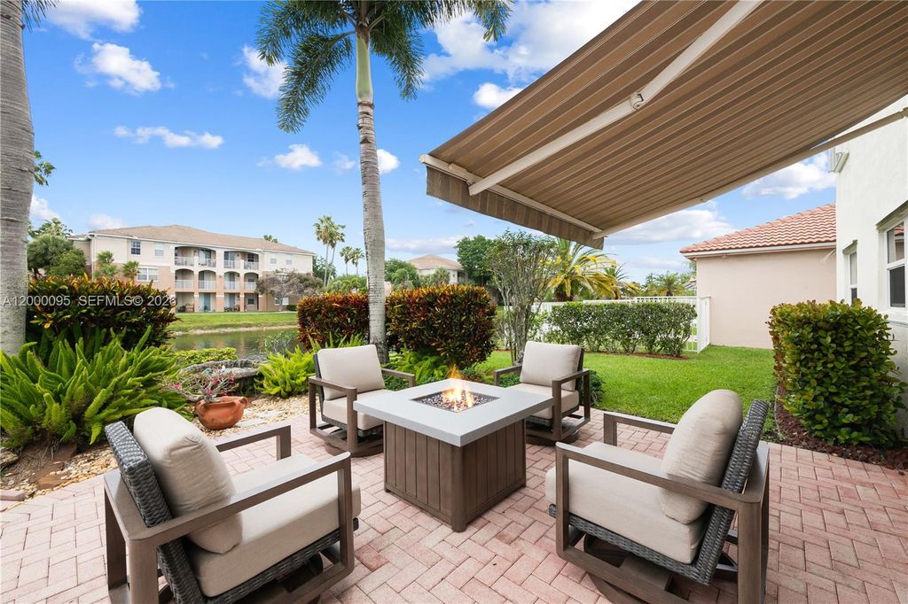 Photo of 3844 NW 63rd Ter, Coral Springs, FL 33067 (MLS # A12000095)