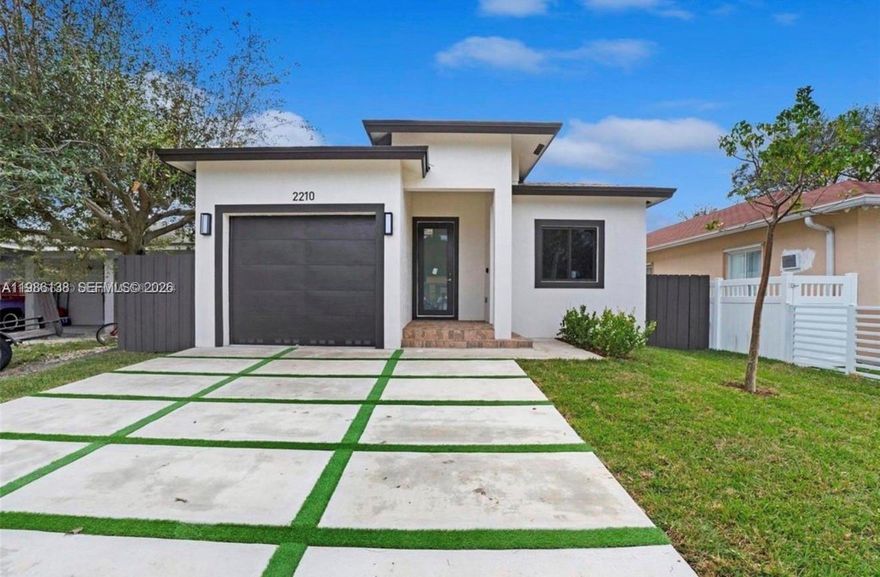 Welcome Home to your New Construction single family turnkey paradise.Total sqft 1,826. 2024 with new roof and new A/C, boasts 3 Bedrooms and 2 Bathrooms, One car garage with EV charger.Cozy living space with a freshly painted interior and exterior, plenty of natural lighting, 10ft high ceilings, impact windows and doors. Quartz kitchen countertop, stunning open floor plan kitchen with new stainless steel appliances, and newly installed flooring. Relax the day away in your newly updated bathroom with modern features. Nice backyard for entertaining. Conveniently located in the city of Hollywood and close to Major Highways,Airport,Beaches, Oakwood Plaza,Dania Pointe, with plenty of shopping, entertainment , and restaurants.