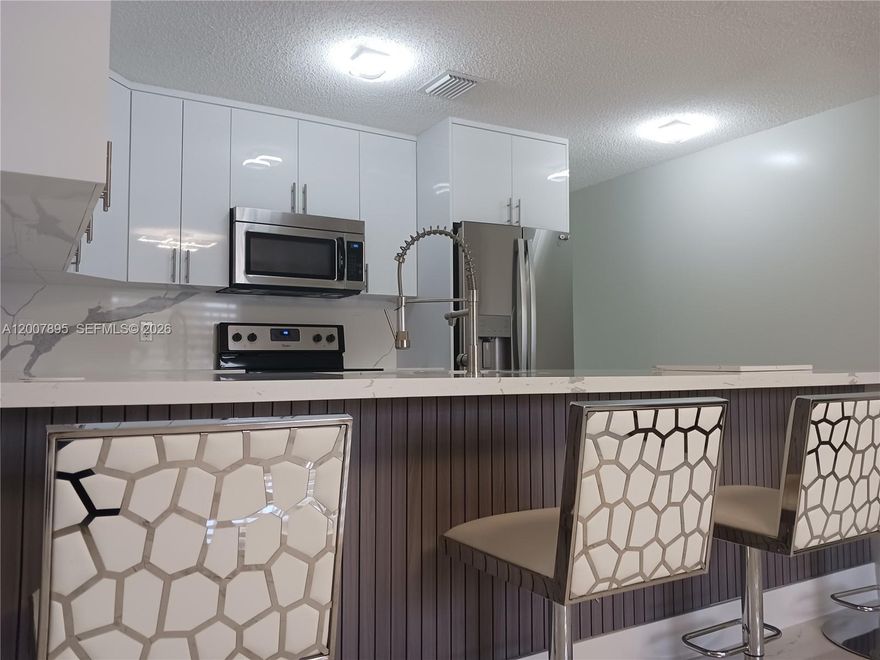 A fantastic opportunity in the Homestead area, ideal for comfortable family living. Enjoy a partially covered patio, perfect for outdoor gatherings and entertaining, AS WELL AS plenty of space for an RV/boat. The home has been meticulously maintained over the years. In 2024, this 3-bedroom/2-bath home had updated ceramic tile flooring installed throughout, as well as installation of a new A/C. The interior was fully repainted in 2026. The home includes a primary suite.  Both bathrooms were updated in 2023. The kitchen has been upgraded with quartz countertops and modern cabinetry.  No HOA adds flexibility and value. Major updates already completed, providing peace of mind for future owners, minimizing future maintenance needs. For info text "ALAIN".