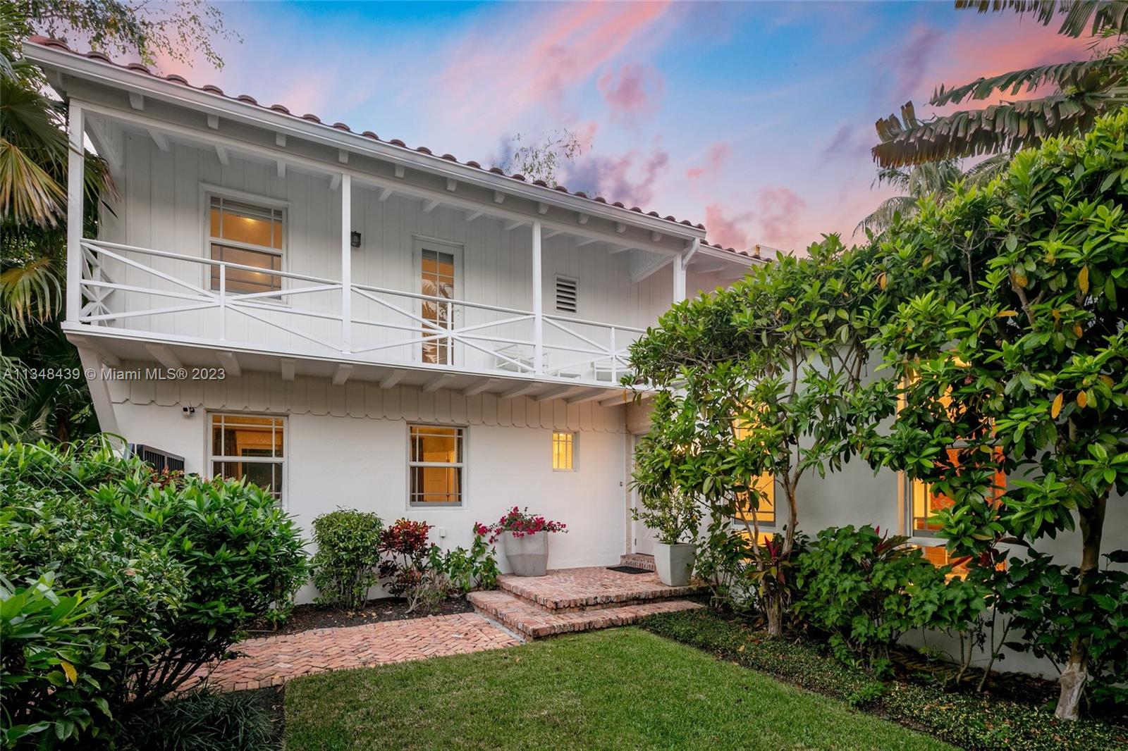 Tucked behind lush landscaping, this fully renovated Miami Beach Bungalow exudes charm & features vaulted ceilings, immaculate terrazzo floors, custom built-ins and abundant natural light through high impact floor-to-ceiling windows. A Gourmet kitchen has a Viking gas range stove & stunning white cabinetry. The home features Updated electric and plumbing as well as a brand new Roof. The ground floor primary suite has a large walk-in closet & spa-like bathroom w/ intricate tiles, free-standing tub & dual sinks. Enjoy a salt water pool & open patio which features French doors that lead into the dining room & access to the primary suite. 2 Car driveway w/ electric for charging. Walking distance to the trendiest shops, restaurants, Trader Joes, Fresh Market & fitness studios in Sunset Harbour.