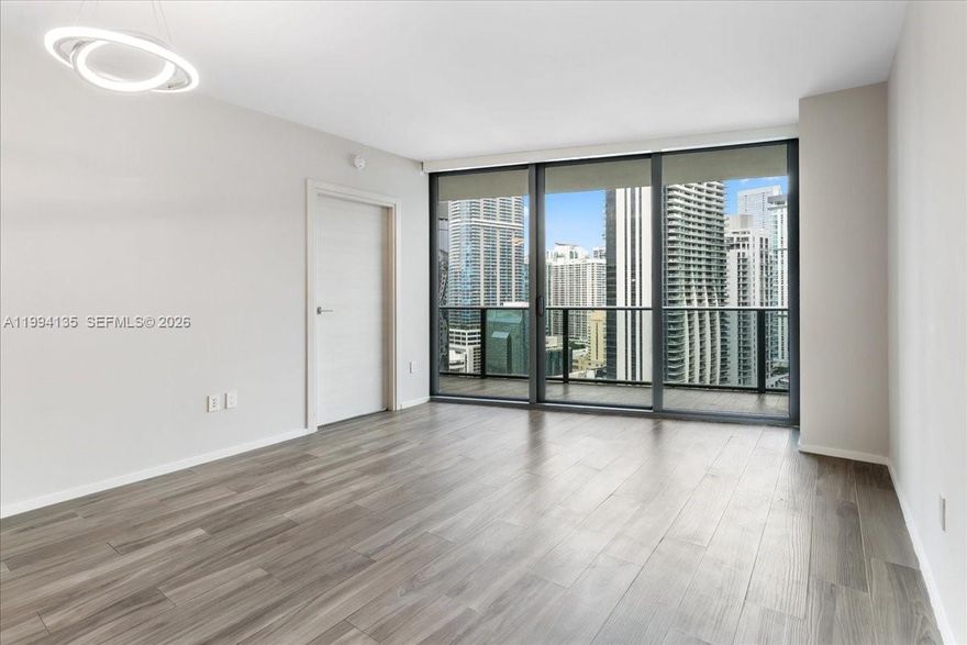 Experience elevated living at SLS Lux Brickell in this sophisticated 1 bedroom + den residence with 2 full bathrooms and a private elevator foyer. Designed with both style and functionality in mind, the open-concept layout features a sleek kitchen with premium stainless steel appliances, modern cabinetry, and a spacious breakfast bar ideal for entertaining.

Floor-to-ceiling glass windows fill the space with natural light and showcase impressive city views, while the private balcony offers the perfect setting to enjoy the vibrant Brickell skyline. The den provides flexibility for a home office, guest space, or media room.

Residents enjoy access to world-class amenities including a rooftop pool and spa, state-of-the-art fitness center, tennis court, basketball court, concierge services, and renowned on-site dining. Located in the heart of Brickell, just steps from premier shopping, restaurants, cafes, and nightlife, this residence offers the ultimate combination of luxury, convenience, and lifestyle.