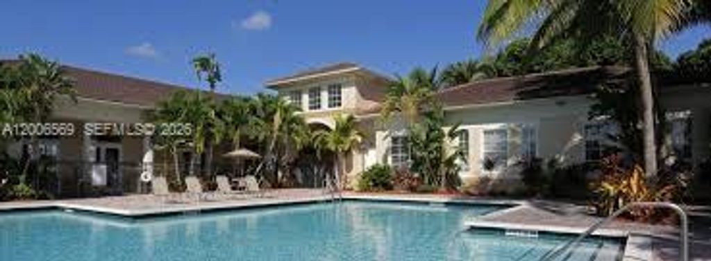 Photo of 2439 Centergate Dr #205, Miramar, FL 33025 (MLS # A12006569)