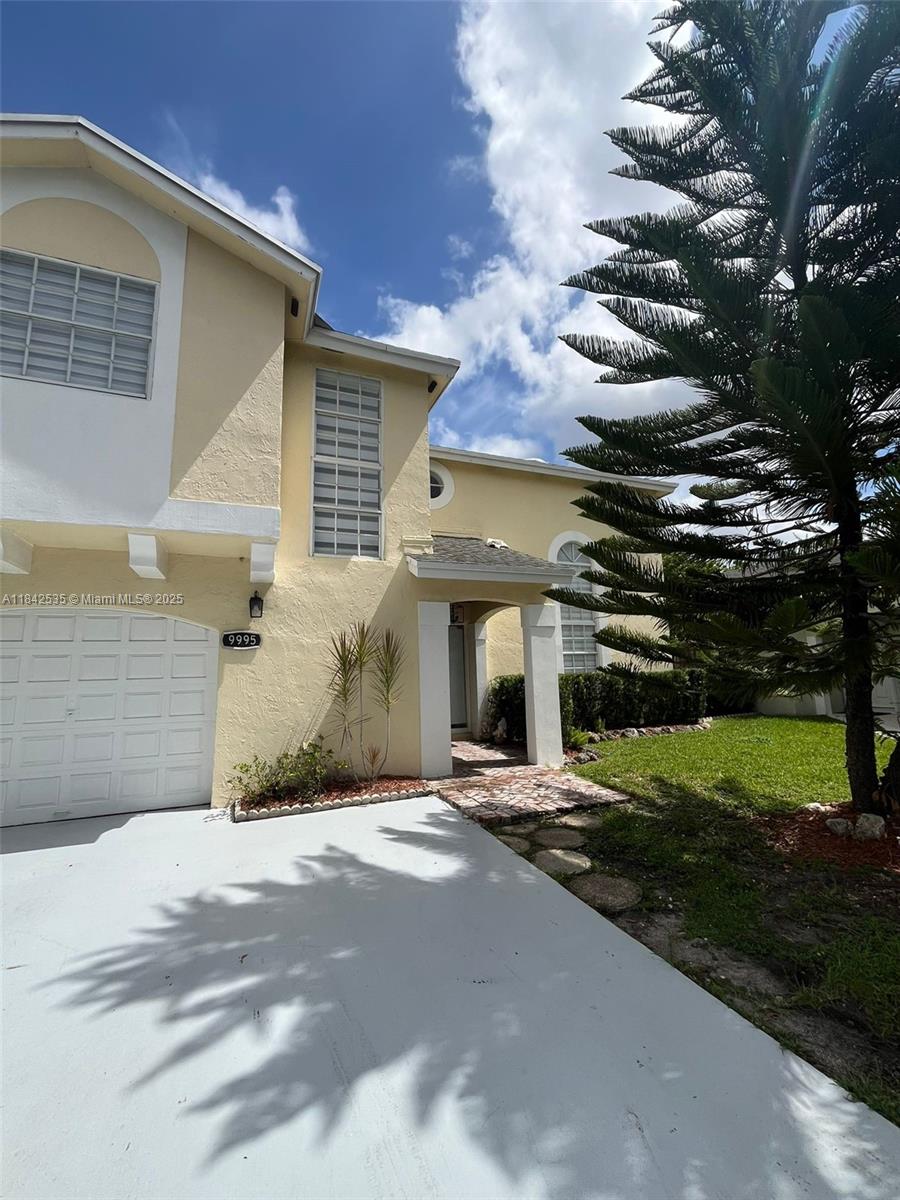 Enjoy this beautiful two-story home with high ceilings and spacious living! Featuring 3 bedrooms and 2.5 bathrooms, bright social areas filled with natural light—perfect for relaxing or entertaining. Admire the serene view of the backyard surrounded by nature, with a wooden deck and pergola, ideal for your morning coffee. Located in a gated community with 24/7 security and exclusive access to the Doral Park Clubhouse. Close to shopping plazas, restaurants, and A+ schools. A family-friendly neighborhood that offers both comfort and lifestyle. The home you deserve is waiting for you!