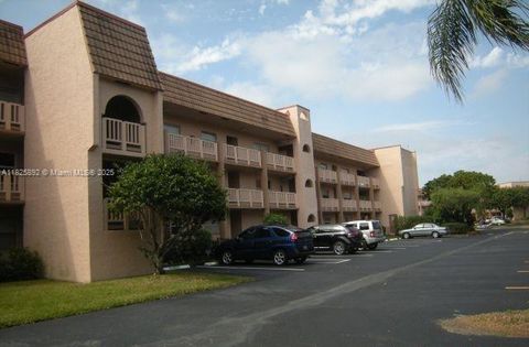 Photo of 9841 Sunrise Lakes Blvd #310, Sunrise, FL 33322 (MLS # A11825892)