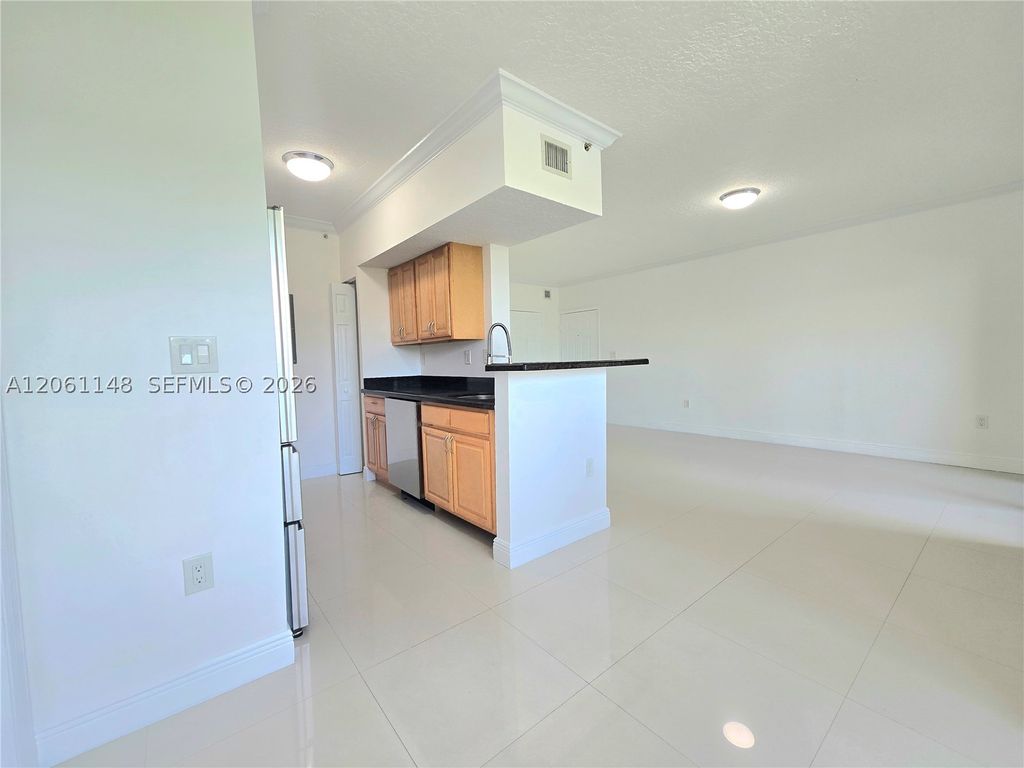 Photo of 11600 SW 2nd St #18104, Pembroke Pines, FL 33025 (MLS # A12061148)