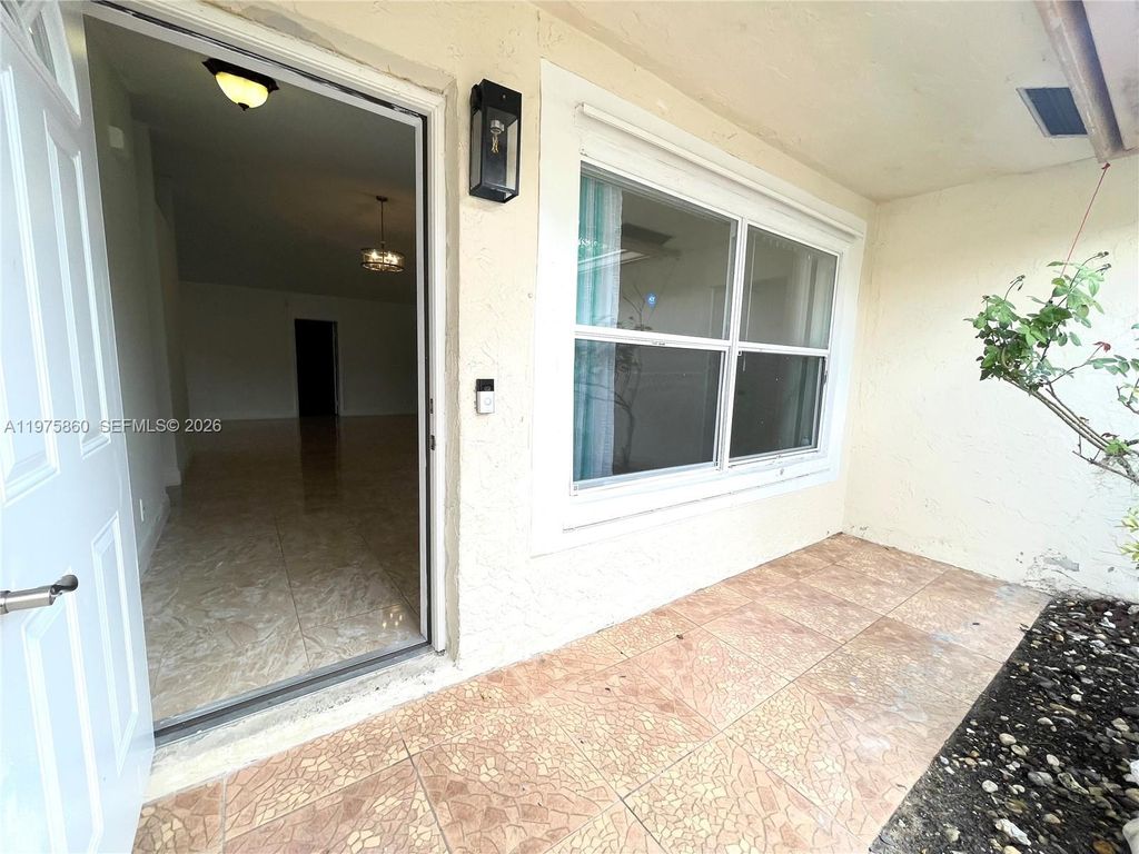 Photo of 9604 NW 49th St, Sunrise, FL 33351 (MLS # A11975860)