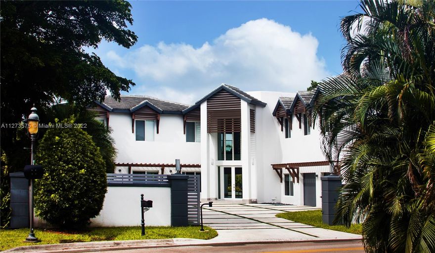 Remodeled in 2014 this over-sized close to 7,000 Square Foot Home offers spacious rooms, living areas and kitchen.  Custom kitchen cabinetry with Sub Zero Wine Cooler and Thermador appliances, Miele microwave and coffee maker.  Kitchen has a dining table which accommodates 10 people.  Separate Laundry room with Washer and Dryer.  Main Dining Room Accommodates up to 15 guests, this room has custom made wood panels and impact windows run throughout the house giving floor to ceiling view in the Foyer and Family Room to the lake and golf course behind the house.  4 bedrooms and 4 baths in the second floor with great views and spacious accommodations.  Two-Car garage has been converted into a gym and upstairs Loft has been converted into an office with 4 desks.