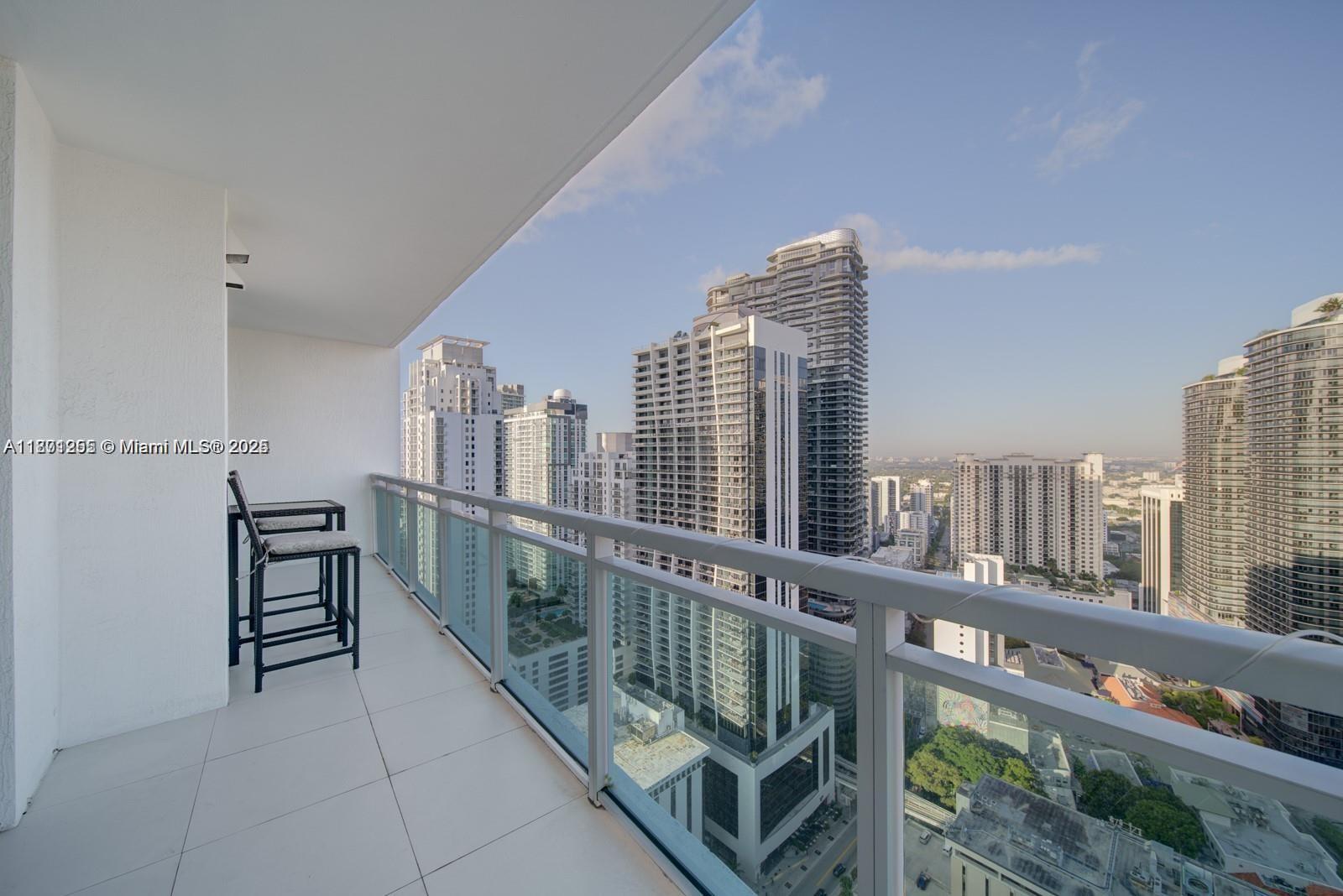 THE PLAZA 901 BRICKELL CO - Residential Lease