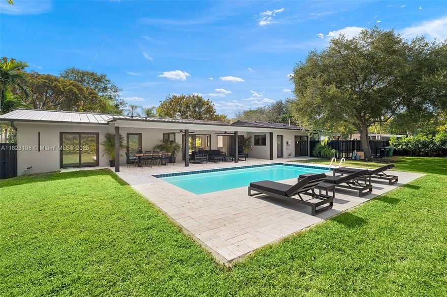 Discover this fully remodeled masterpiece w 2,011 ADJ SQFT LA in Pinecrest! Everything is NEW: roof (10-year
wty), electrical, plumbing, insulation, impact windows, modern bathrooms, kitchen w new Samsung appliances, &
thoughtfully designed floor plan. Situated on a spacious 16,770 sq ft lot, steps from Pinecrest's top-rated schools.
The home features a modern living/dining area w covered terrace access, luxurious master suite with built-in
walk-in closet, junior suite w private bathroom & walk in closet w garden views, & 2 Jack & Jill bedrooms (1 of the
bedrooms is currently open to the living room and could be used as office or tv room). landscaping,
irrigation system, & carport for 2 cars. Move into high-end living without the hassle of construction—an
unparalleled opportunity.