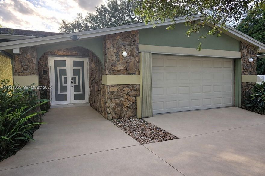 Stunning Private Estate for Rent in Davie on 2 Acres

Rare opportunity to rent a truly one of a kind private estate in the heart of Davie. Situated on a fully gated two acre lot with a private sliding gate entrance, this exceptional property offers total privacy, space, and freedom with no HOA or restrictions.

This beautifully updated three bedroom, two bathroom home features an open floor plan with elegant porcelain floors throughout, a modern kitchen with quartz countertops, and designer finished bathrooms. The layout is bright, spacious, and ideal for both everyday living and entertaining.

Step outside to your resort style backyard featuring an oversized heated swimming pool with spa, an expansive covered patio, and serene views of your own private pond adorned with beautiful lily pads. The outdoor space is unmatched and perfect for relaxing, hosting, or enjoying nature in complete privacy.

The property includes a two car garage and is fully fenced on all sides, offering a rare combination of seclusion and convenience. Davie allows residents to keep horses, chickens, and other animals, making this an ideal home for those seeking a true Davie lifestyle.

Centrally located just minutes from the Turnpike, University Drive, 441, the Hard Rock Hotel and Casino, and approximately 15 minutes from the beach. Properties like this rarely come available for rent.

A true gem with no comparison in the area.