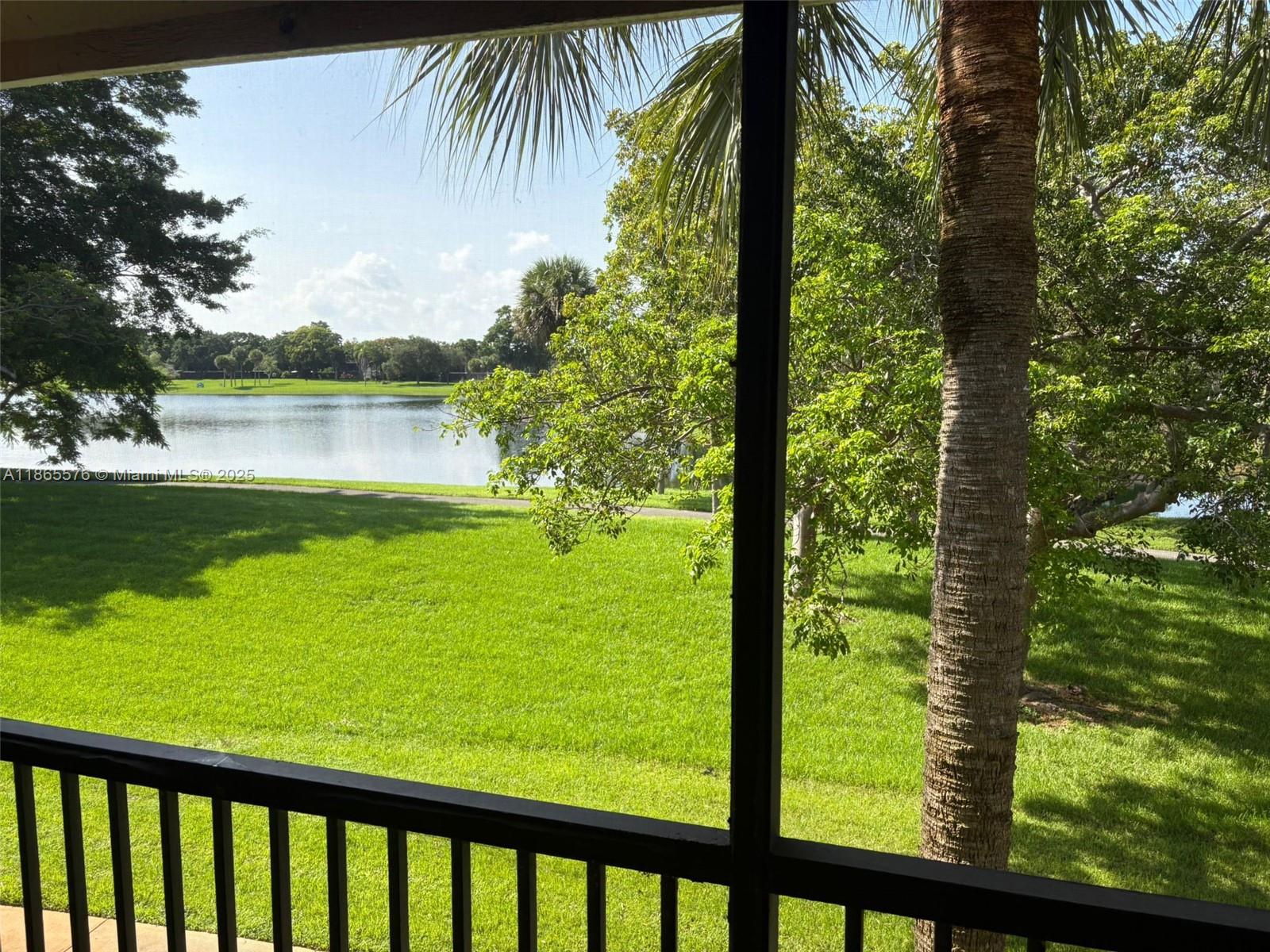 BEAUTIFUL AND UPDATED 2-BEDROOM APARTMENT WITH AMAZING LAKE VIEW...GATED COMMUNITY...2 ASSIGNED PARKING SPACES..2ND FLOOR UNIT OFFERS GREAT LAYOUT...NEWLY REMODELED KITCHEN AND BATHROOMS...SCREENED BALCONY WITH GORGEOUS VIEWS TO HAMMOCKS LAKE...WASHER AND DRYER AND MUCH MORE!!
