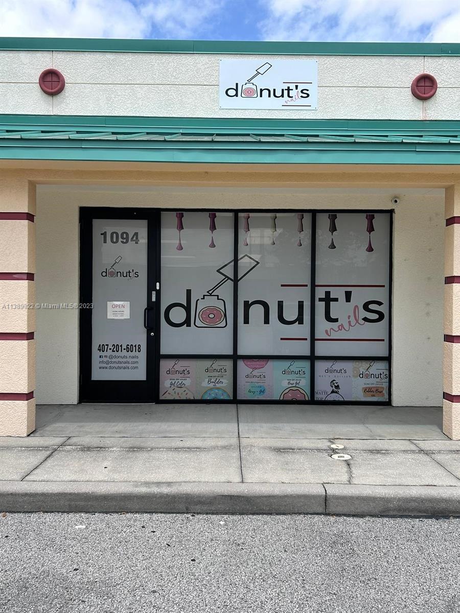 Great Location near Airport, Hwy 192, Florida Turnpike. Busy commercial District and plaza/ strip Center. fully upgraded. office/retail unfurnished condo with wood laminate floors and hallway, upgraded. kitchen with white cabinetry, reception area. 12' store front, ample parking in front and sides.