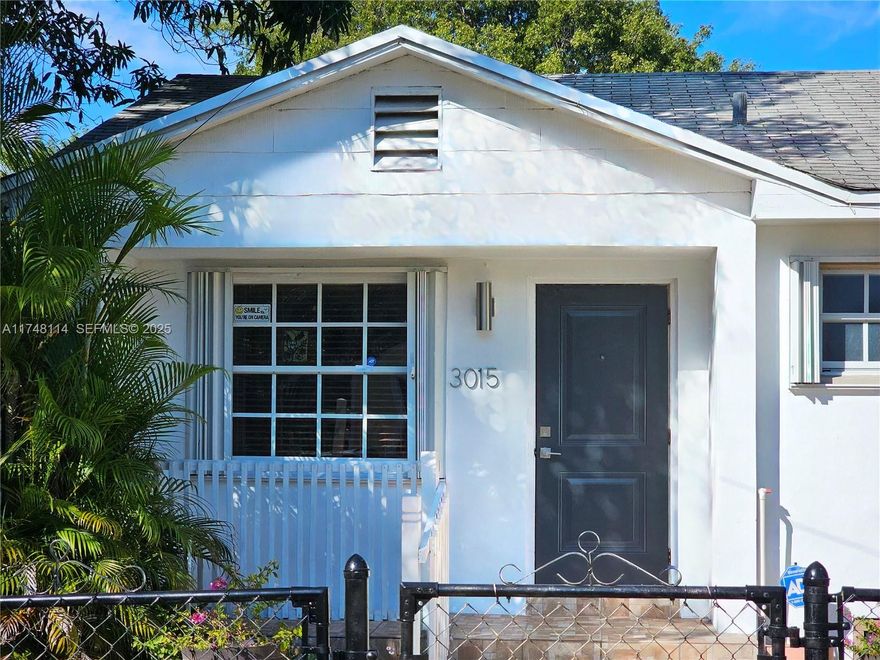 Price reduced and motivated sellers now offering unbeatable value in the prime Silver Bluff/NE Coconut Grove area. This charming 3-bed, 2-bath home (1,404 sq ft) features a bright, open layout and updated electrical, HVAC, kitchen, and main bath. Highly desirable T3-O zoning provides duplex, rental, studio, or workspace potential. The third bedroom includes a private entry—ideal for guests or supplemental income. The garage and long driveway accommodate a boat, RV, or multiple vehicles. Walk to Grove Central, Publix, Target, and the Metrorail. Minutes from Coral Gables, Coconut Grove, Brickell, and Downtown. No HOA and now priced to sell. Sold AS-IS.