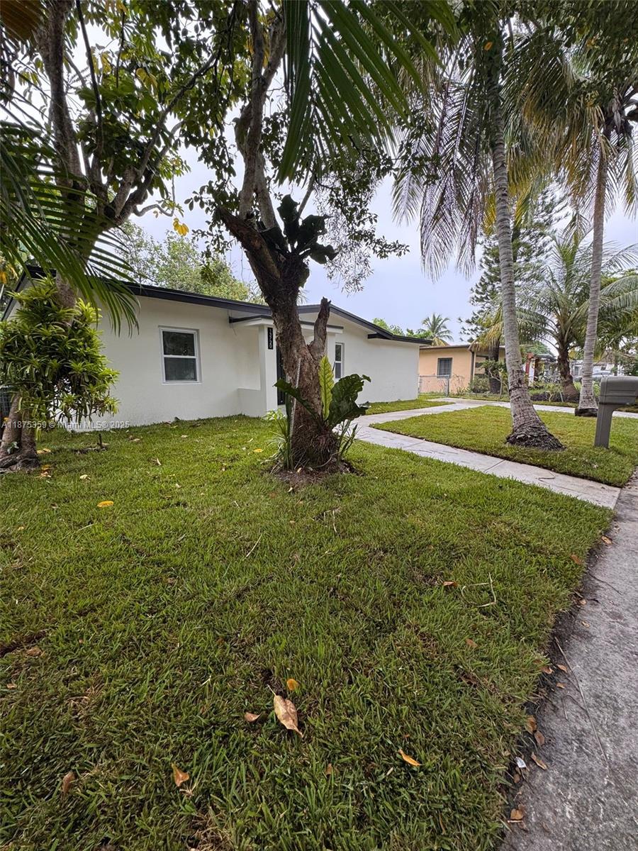 Outstanding opportunity of a new remodeled house in North Miami Beach. This 3bed/2bath, total lot of 7000 + sq ft one-story home. Property offers laundry/utility space. With tile flooring throughout, central A/C, full impact glass. NEW ROOF 2025. Exterior includes a driveway. House is a solid concrete-block construction ensures durability. Nestled in a quiet neighborhood just 1 minute from I-95, there are beautiful square parks thought out the neighborhood and top amenities. Perfect blend of size, character and potential!