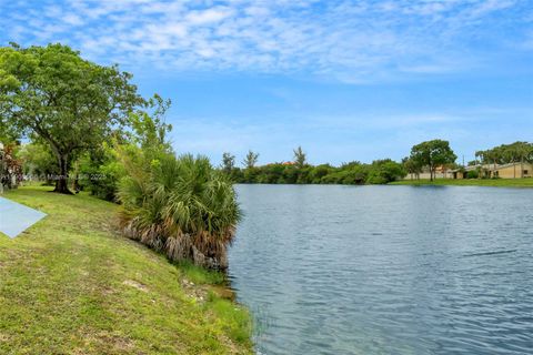 Photo of 6545 Racquet Club Dr #115, Lauderhill, FL 33319 (MLS # A11905566)