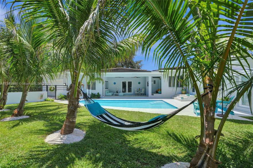 Located on a generous 16600 sq. ft. corner lot on prestigious Granada Blvd. This beautifully updated home presents a perfect home to live in!!!. With over 4000 adjusted sq. ft it features a spacious and luxurious owner's suite with dual closets, shower and tub. 4 additional bedrooms and 3 baths. Great updated kitchen opening to family room and dining room area. It features a beautiful patio overlooking pool area and plenty of grassy areas for entertaining. The roof is only seven years old and impact windows and doors. Ready to move into. Don't miss this opportunity!!