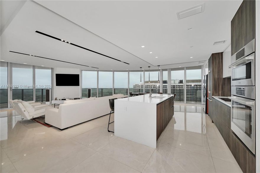 Breath-taking corner unit with upgraded finishes throughout. Step from your private foyer to direct views of the best Miami has to offer, including the Bay of Miami, the Port of Miami, Miami Beach, and the Miami skyline. Enjoy these views from the wrap-around balcony or any of the unit's rooms. The unit has 3 bedrooms and 4 bathrooms. Upgraded unit including Marble flooring, power shades and other items making this unit a must-see. This luxurious property is move-in ready with the best views Miami has to offer. Property, Aria on the Bay is a luxurious building with top-of-line amenities at your doorstep. It is located in the vibrant community of Edgewater.