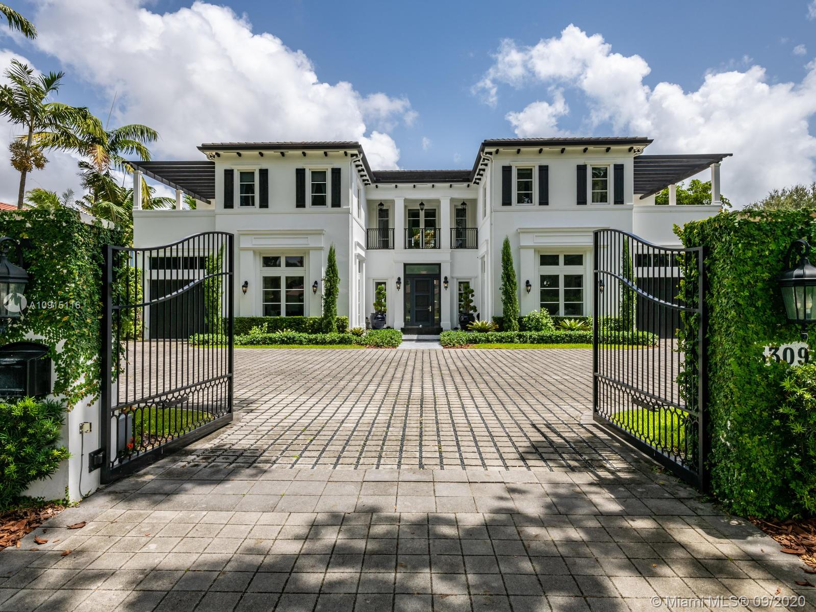 With impressive entrance, and black onyx infinity fountain, this grand elegant residence boasts high ceilings, imported Italian marble, an elevator, large living area, spacious family area, gorgeous dining room, and fabulous gourmet chef's kitchen. Outdoors that you can enjoy with a huge heated pool and covered gazebo, full kitchen with two grills, and pizza oven. Entertaining friends and family will be a delight, since there are plenty garages and extra parking for 12 vehicles. Located right on prestigious Granada Boulevard, between Coral Way and Bird Road, and within walking distance to the Biltmore Hotel, Venetian Pool, golf & tennis club and all the shops on Miracle Mile, this is an opportunity you do not want to miss. Easy to show Monday to Friday 4:00-7:00pm