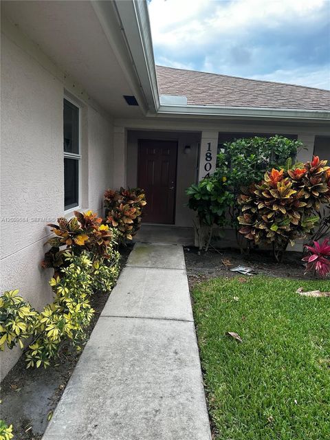 Photo of 1804 Blue Heron Ln #C, Fort Pierce, FL 34982 (MLS # A12009584)