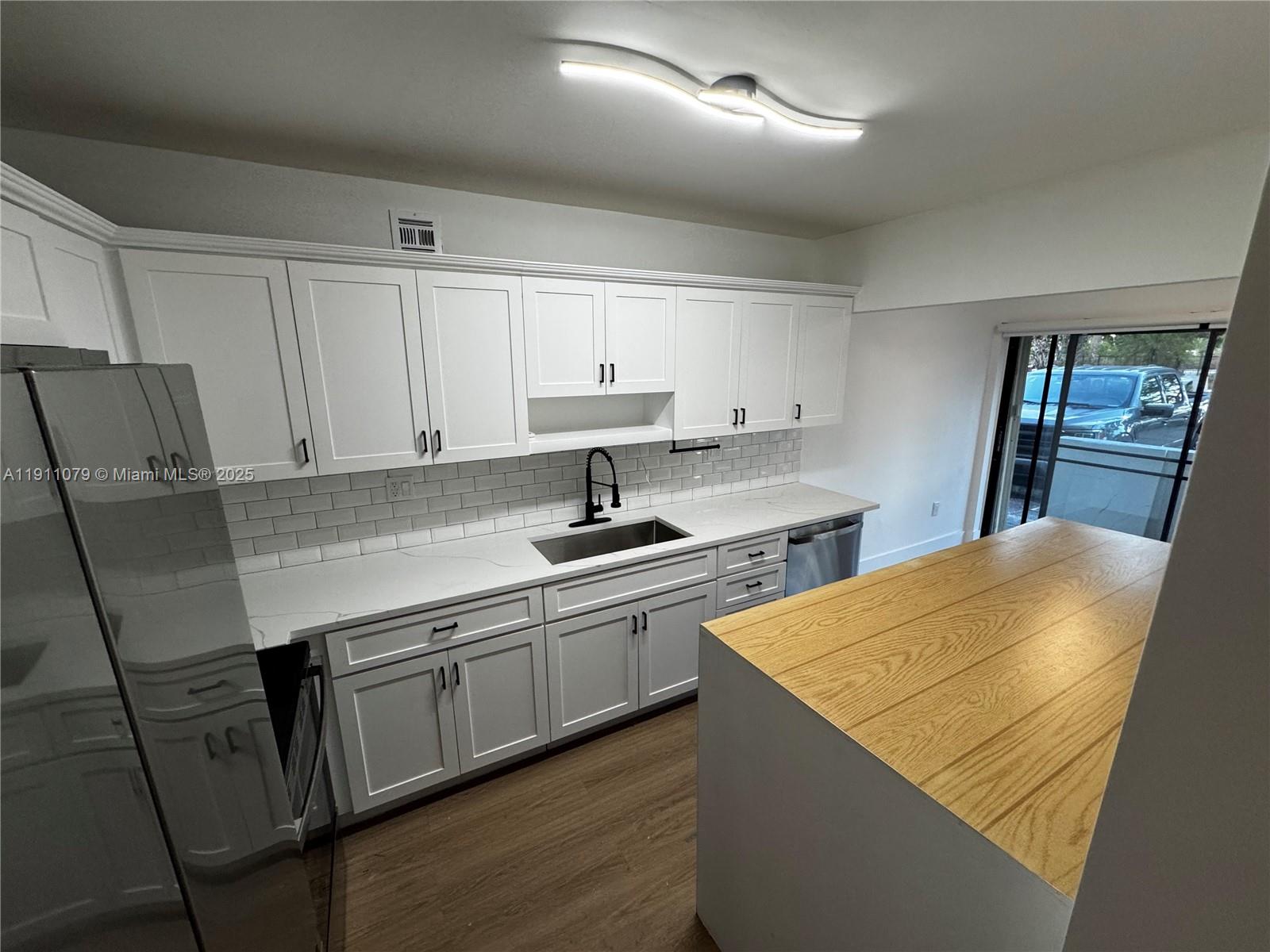 MILLER GARDENS CONDO - Residential