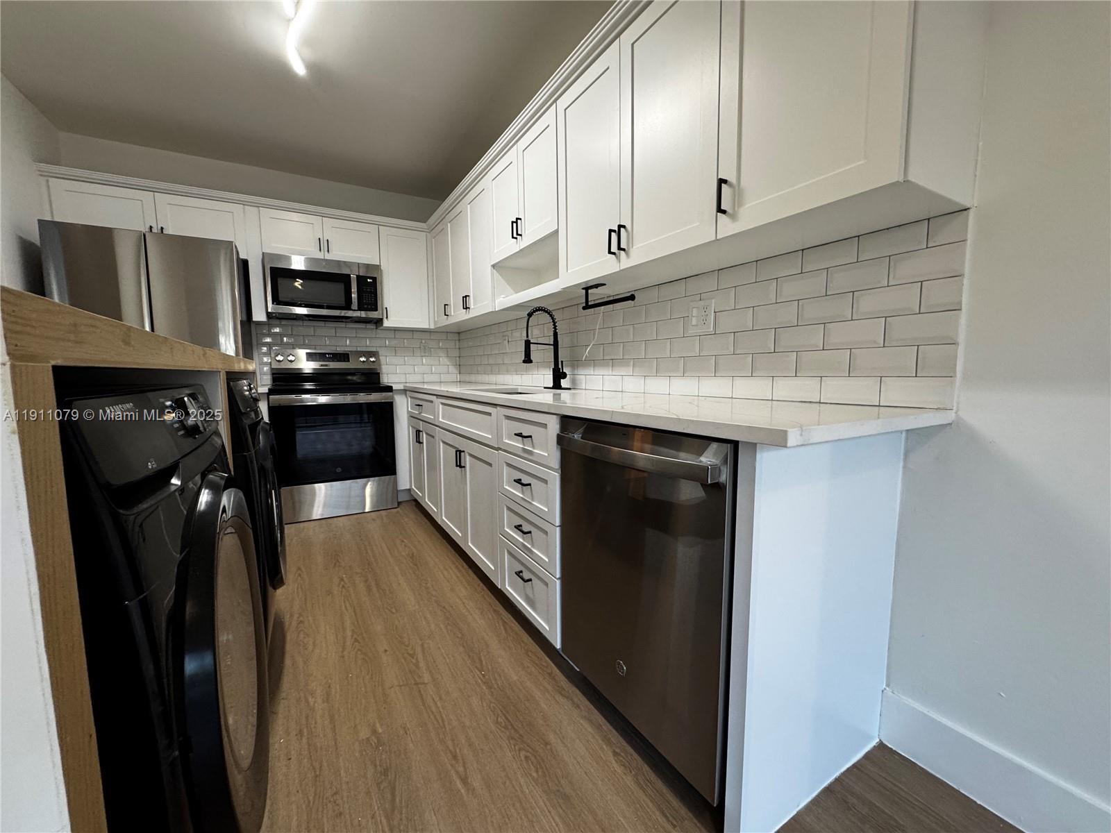 MILLER GARDENS CONDO - Residential