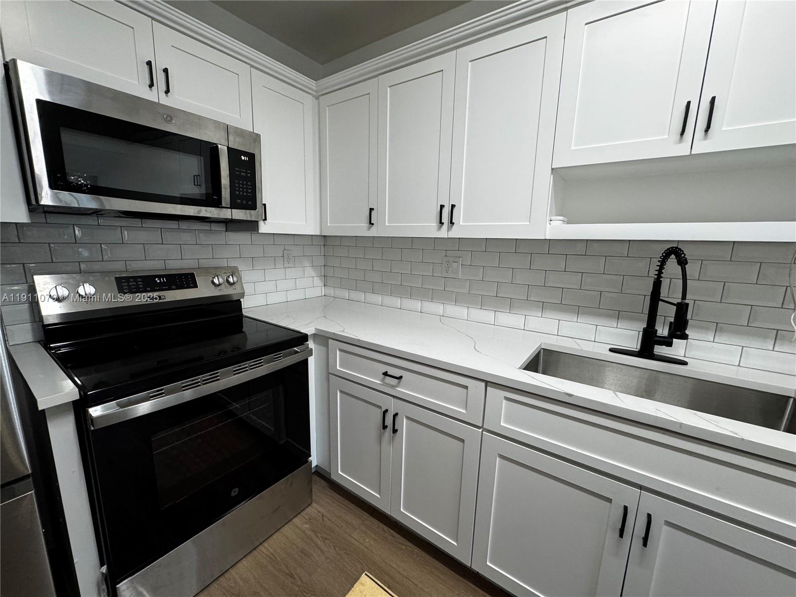 MILLER GARDENS CONDO - Residential