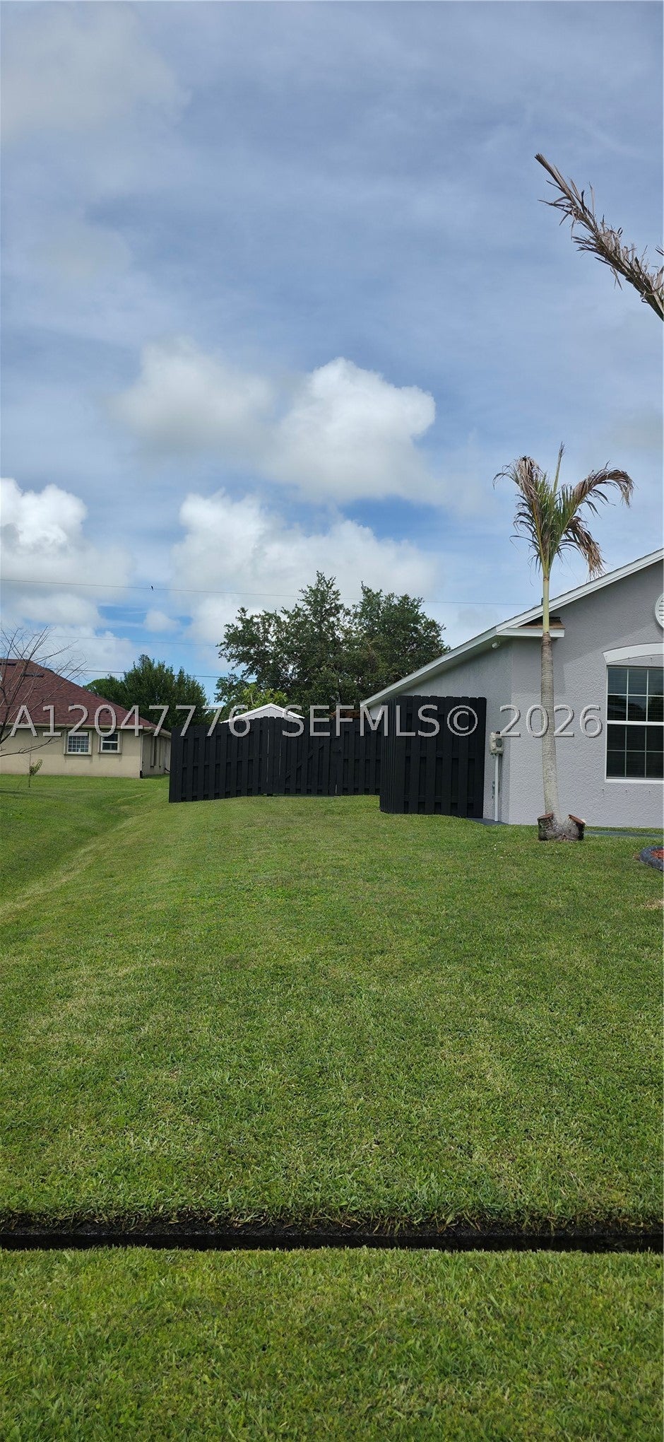 Photo of 2037 SW Aquarius Ln, Port St Lucie, FL 34984 (MLS # A12047776)
