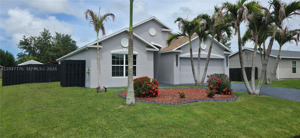 Photo of 2037 SW Aquarius Ln, Port St Lucie, FL 34984 (MLS # A12047776)